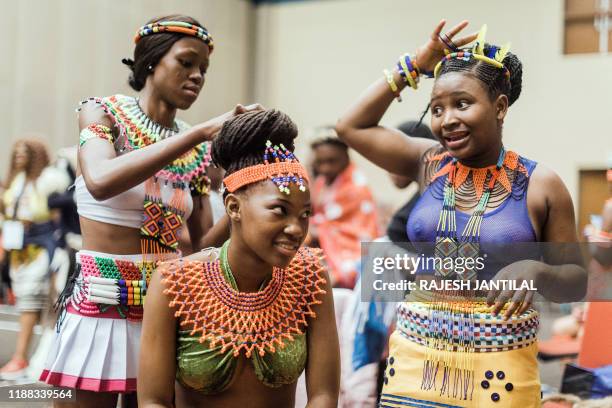 People in their traditional Zulu outfits prepare to take part in the 3 day Indoni Cultural Festival on December 13 in Durban. The Indoni festival,...