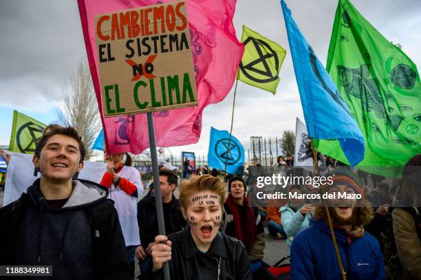 Activists shouting during a protest outside IFEMA ,where UN Climate Change Conference COP25 is being held. Fridays for Future and Extinction...
