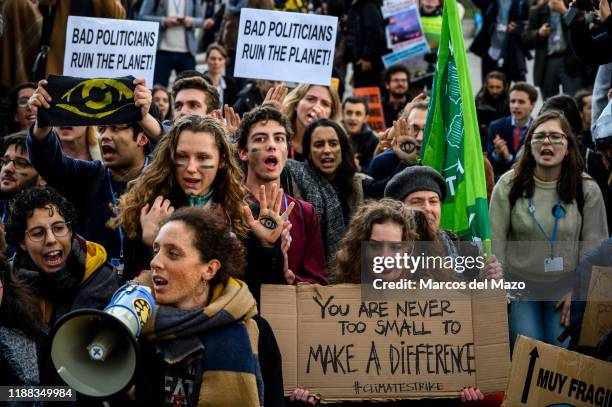 Activists shouting during a protest outside IFEMA ,where UN Climate Change Conference COP25 is being held. Fridays for Future and Extinction...