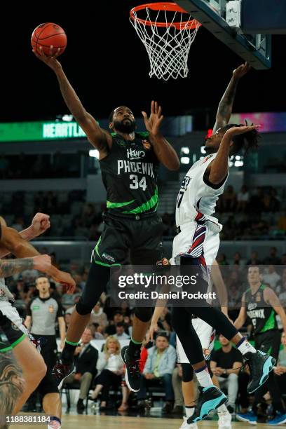 Keith Benson of the Phoenix drives to the basket during the round seven NBL game between the South East Melbourne Phoenix and the Adelaide 36ers at...