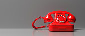 Red old phone on gray color background. 3d illustration