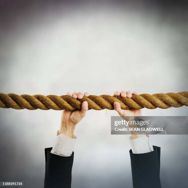 Grab That Rope Grabbing Rope Photos and Premium High Res Pictures - Getty Images