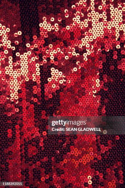 Sequins Red Pattern Red Sequin Fabric Photos and Premium High Res Pictures - Getty Images