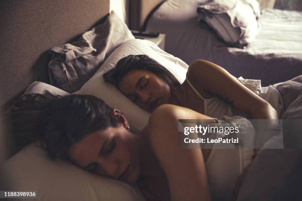 happy lgbtqi couple at home - lesbian bed stock pictures, royalty-free photos & images