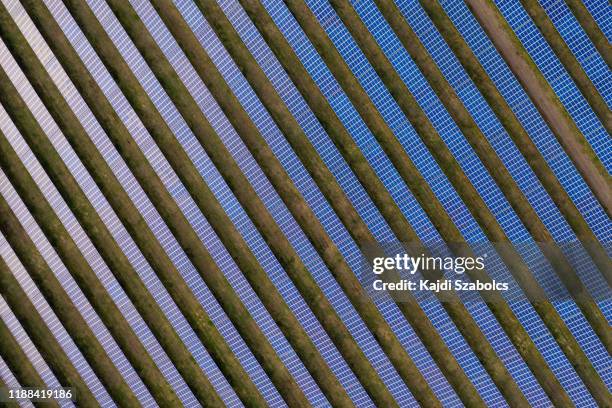 aerial view of solar panels - alternative energy stock pictures, royalty-free photos & images