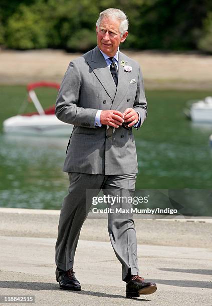 Prince Charles, Prince of Wales tours Salcombe harbour on the first day of his and Camilla, Duchess of Cornwall's annual summer visit to Devon and...