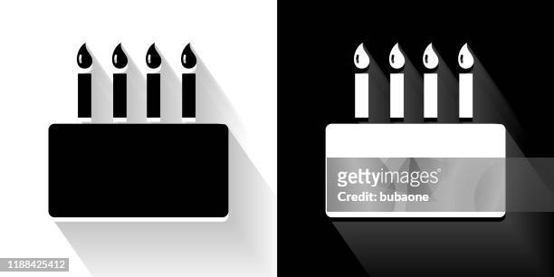 birthday cake  black and white icon with long shadow - birthday candles stock illustrations