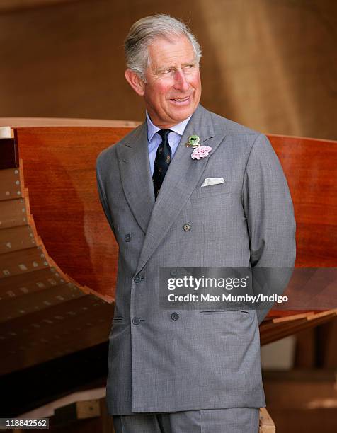 Prince Charles, Prince of Wales visits a boat builder on the first day of his and Camilla, Duchess of Cornwall's annual summer visit to Devon and...