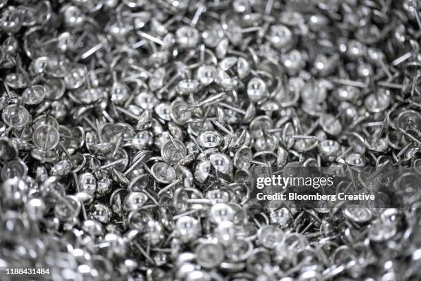 silver metal furniture tacks - punaise stockfoto's en -beelden