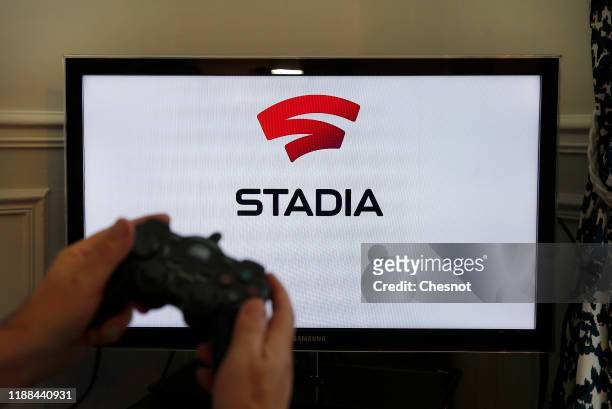 In this photo illustration, the Stadia logo is displayed on the screen of a TV on November 18, 2019 in Paris, France. Stadia is a streaming platform...