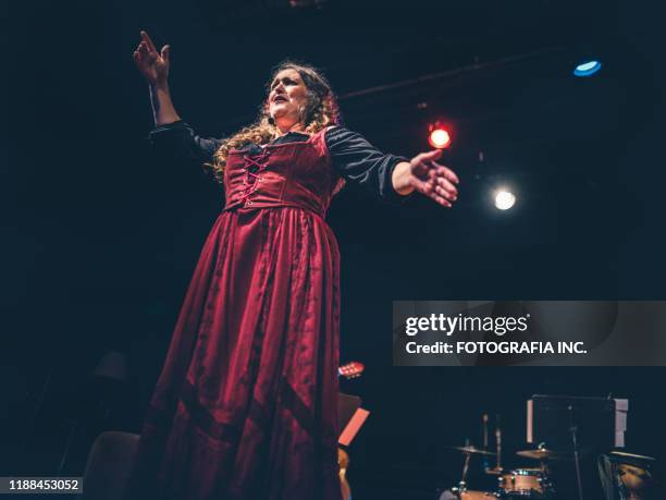 opera singer performing on the stage - hamilton musical stock pictures, royalty-free photos & images