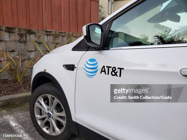 Close-up of logo on vehicle from telecommunications company ATT in a suburban neighborhood, San Ramon, California, November 13, 2019.