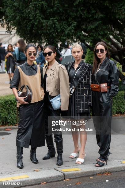 Digital influencers Pornwika Spierker, wears Joshua Millard dress and tank top, Boyy boutique bag, Guo Xiayan wearing all Maison Margiela, Justyna...