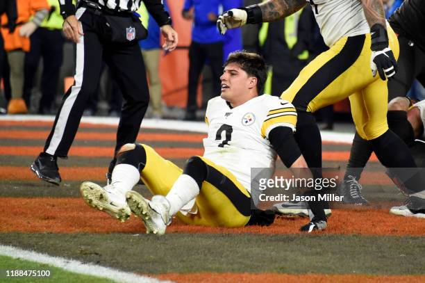Quarterback Mason Rudolph of the Pittsburgh Steelers sits on the field after fighting with defensive end Myles Garrett of the Cleveland Browns during...