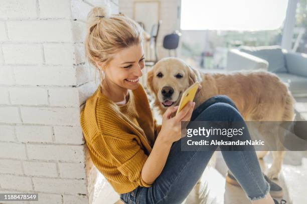 reading morning news online with a company - eastern european woman stock pictures, royalty-free photos & images