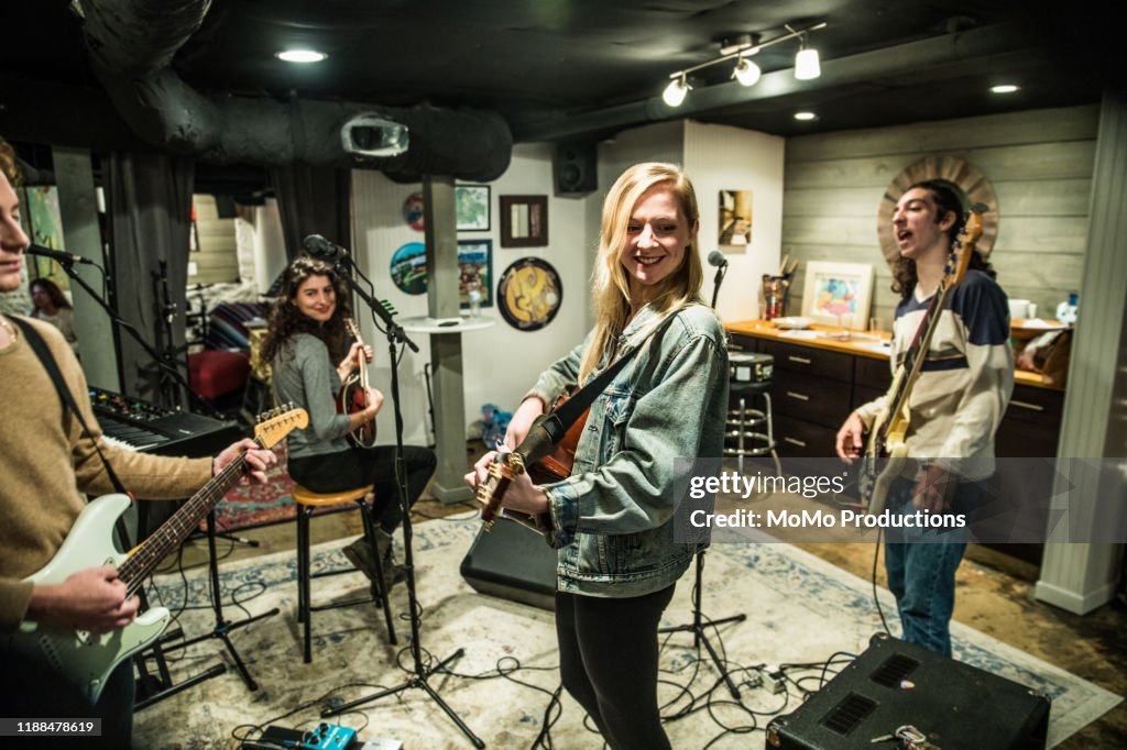 Two Laughing Rocks Young Rock Band Rehearsing Together And Laughing High-Res Stock Photo ...