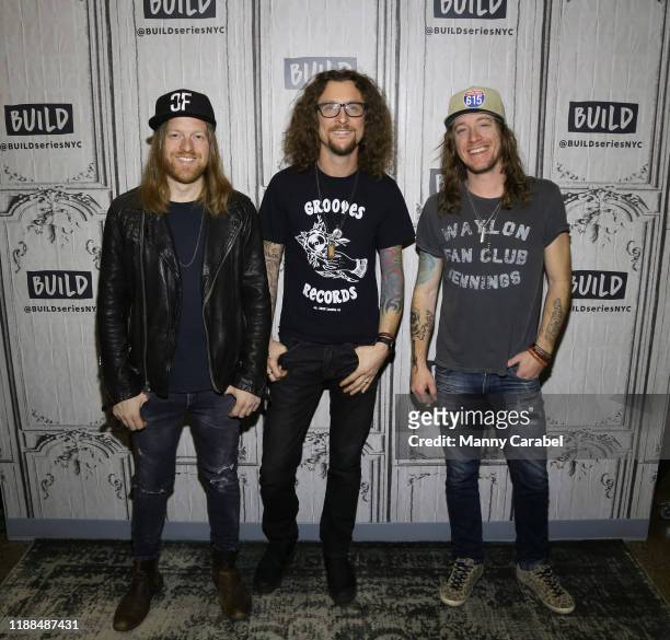 Neil Mason, Kelby Ray and Jaren Johnston of the rock band 'The Cadillac Three' attend Build Series to discuss their new album "Country Fuzz" at Build...