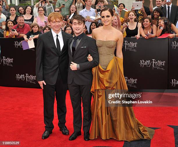 Rupert Grint, Daniel Radcliffe and Emma Watson attend the New York premiere of "Harry Potter And The Deathly Hallows: Part 2" at Avery Fisher Hall,...