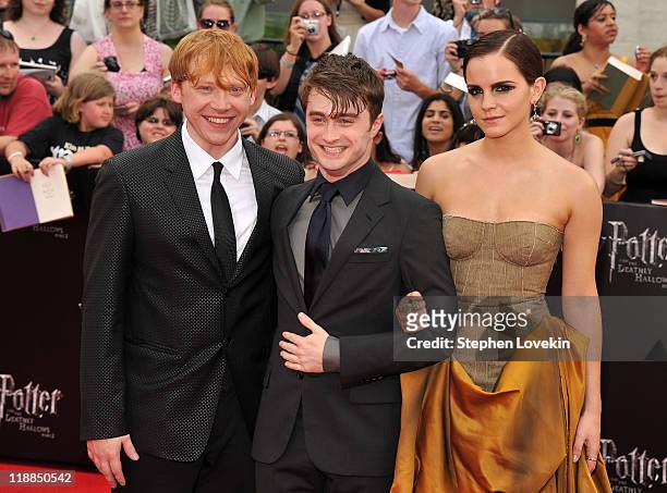 Rupert Grint, Daniel Radcliffe and Emma Watson attend the New York premiere of "Harry Potter And The Deathly Hallows: Part 2" at Avery Fisher Hall,...