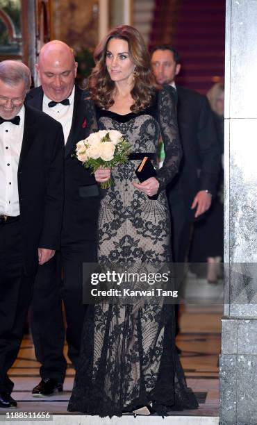 Catherine, Duchess of Cambridge departs after attending the Royal Variety Performance with Prince William, Duke of Cambridge at the London Palladium...