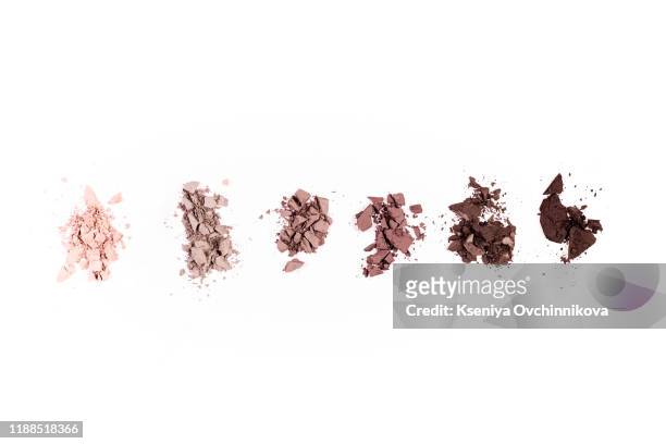 a smashed, neutral toned eyeshadow make up palette isolated on a white background - gold eyeshadow imagens e fotografias de stock