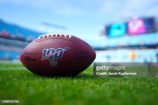 An NFL football with the Play 100 logo before the game between the Carolina Panthers and the Atlanta Falcons at Bank of America Stadium on November...