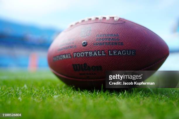An NFL football with logo before the game between the Carolina Panthers and the Atlanta Falcons at Bank of America Stadium on November 17, 2019 in...