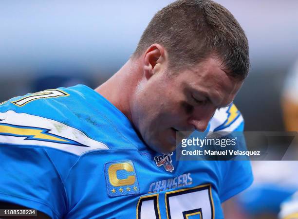 Quarterback Philip Rivers of the Los Angeles Chargers looks down during the game against the Kansas City Chiefs at Estadio Azteca on November 18,...