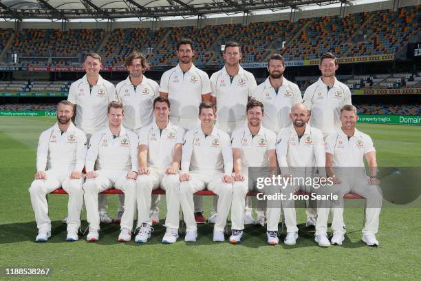 The Australian test cricket team pose for a team photo during a media opportunity at The Gabba on November 19, 2019 in Brisbane, Australia.