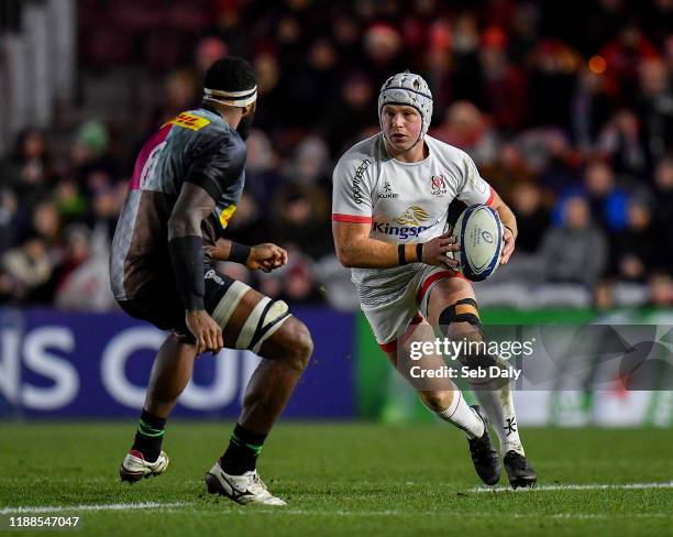 London , United Kingdom - 13 December 2019; Luke Marshall of Ulster in action against Semi Kunatani of Harlequins during the Heineken Champions Cup...
