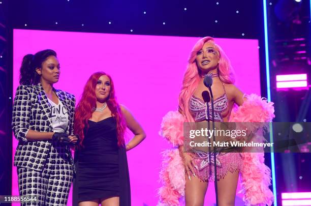 Tyra Banks and Jaclyn Hill present award to Nikita Dragun onstage during the 2nd Annual American Influencer Awards at Dolby Theatre on November 18,...