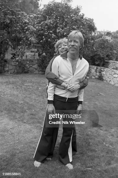Martial artist and star of action movies Chuck Norris in the garden of his home in Palos Verdes California with his wife Dianne Kay Holechek