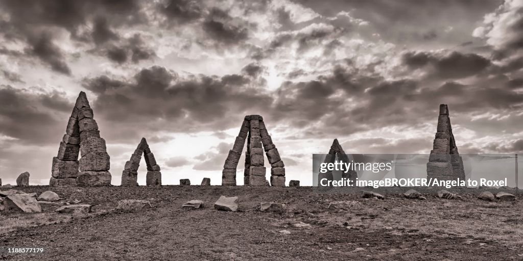 Dramatic cloud atmosphere over monumental stone circle, Arctic Henge, Raufarhoefn, Melrakkasletta, North East Iceland, Iceland