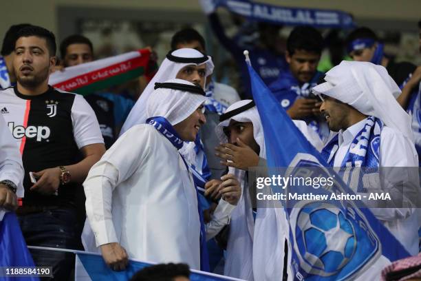 Al Hilal fans weaing scarves during the FIFA Club World Cup 2nd round match between Al Hilal and Esperance Sportive de Tunis at Jassim Bin Hamad...