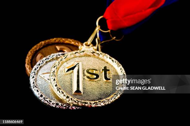 winning medals - silver medal with ribbon stock pictures, royalty-free photos & images