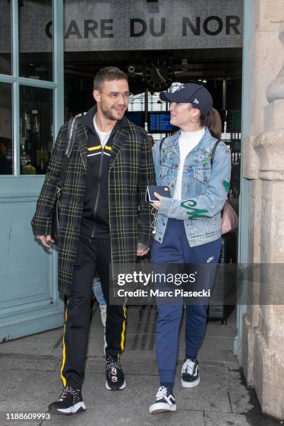 Singer Liam Payne and Maya Henry are seen at Gare du Nord station on November 19, 2019 in Paris, France.