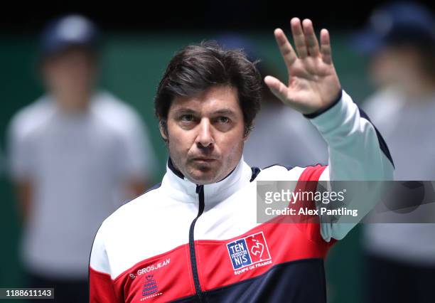 Sebastien Grosjean, Captain of France waves to fans ahead of their match against Japan during Day two of the 2019 Davis Cup at La Caja Magica on...