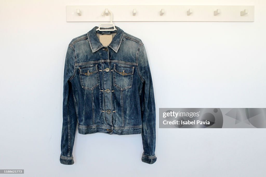 Jacket Hanging On Rack Denim Jacket Hanging On Rack High-Res Stock Photo - Getty Images