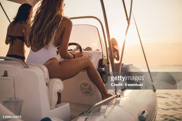 yachting is fun - boat steering wheel stock pictures, royalty-free photos & images