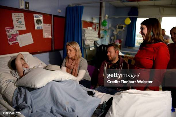 Leader of the Liberal Democrats, Jo Swinson, chats to a patient, during her visit to the children’s emergency department and wards at University...