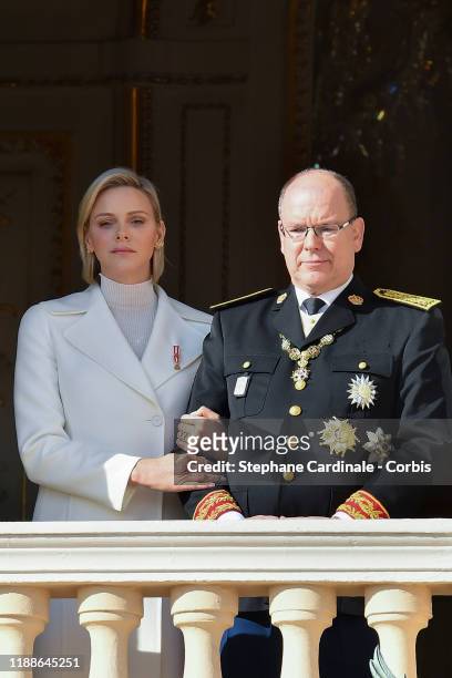 Princess Charlene of Monaco and Prince Albert II of Monaco pose at the Palace balcony during the Monaco National Day Celebrations on November 19,...
