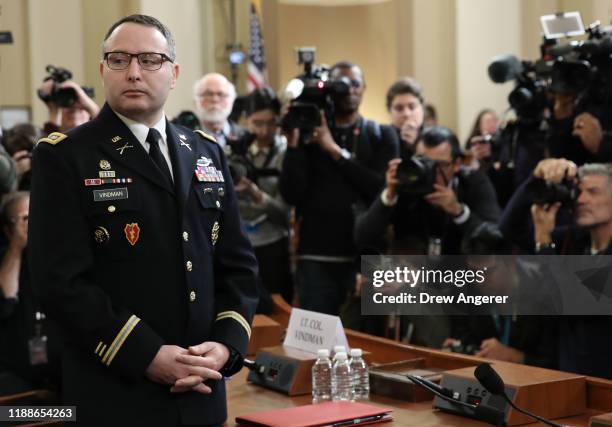 Lt. Col. Alexander Vindman, National Security Council Director for European Affairs, arrives to testify before the House Intelligence Committee in...
