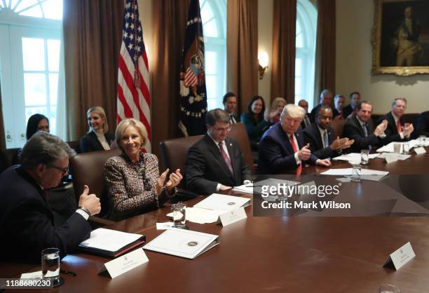 President Donald Trump acknowledges outgoing Energy Secretary Rick Perry during a cabinet meeting at the White House on November 19, 2019 in...