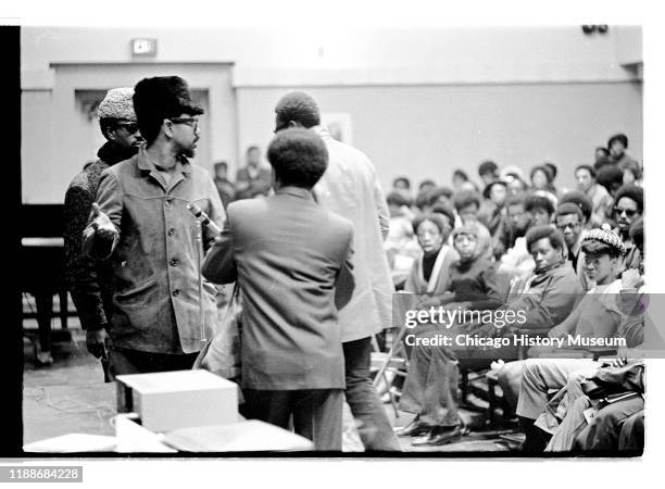 View of American social activist and Illinois Black Panther Party chapter founder Bobby Rush and Malcolm X College President Dr Charles Hurst Jr ,...
