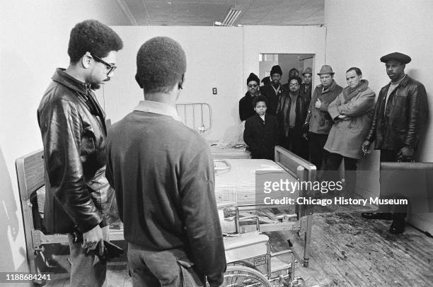 As onlookers watch, American social activist and Illinois Black Panther Party chapter founder Bobby Rush is shown newly donated hospital beds and...