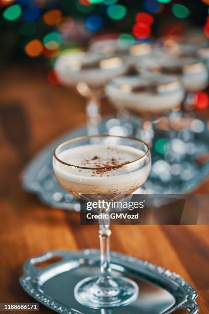 eggnog with cinnamon for christmas - eggnog stock pictures, royalty-free photos & images