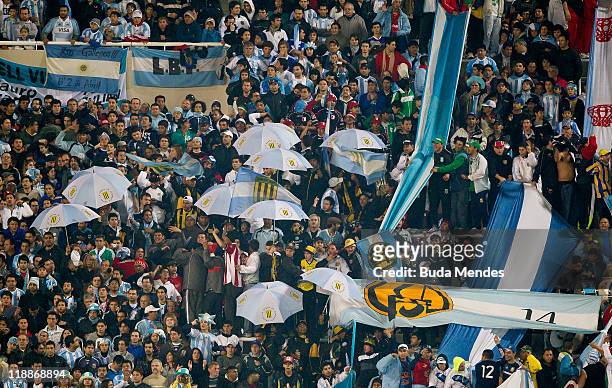 Fans of Argentina during a match as part of Group A of Copa America 2011 at the Mario Kempes Stadium on July 11, 2011 in Cordoba, Argentina.