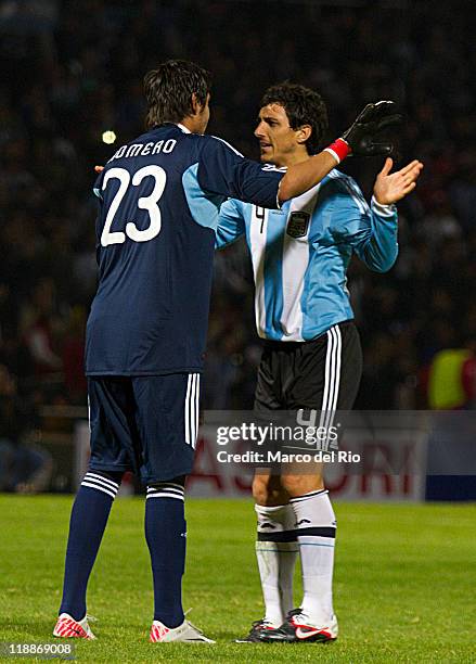 Sergio Romero and Nicolas Burdisso of Argentina during a match against Costa Rica as part of group A of 2011 Copa America at the Mario Kempes Stadium...