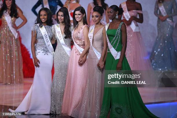 The final five Miss Jamaica Toni-Ann Singh, Miss India Suman Ratansingh Rao, Miss Brazil Elis Coelho, Miss France Ophely Mezino and Miss Nigeria...