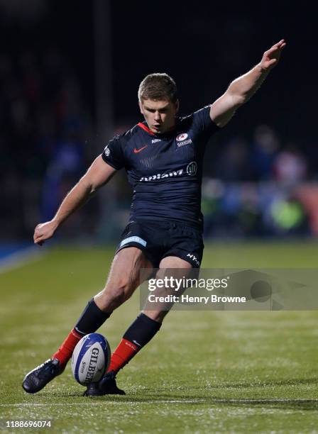 Owen Farrell of Saracens kicks a conversion during the Heineken Champions Cup Round 4 match between Saracens and Munster Rugby at Allianz Park on...